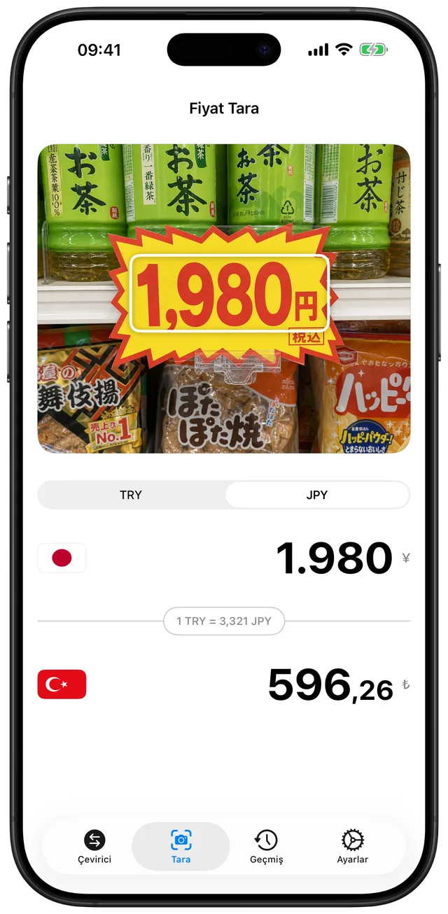 Kamera görünümü: ¥1.980 yazan bir Japon mağaza fiyat etiketini tarıyor ve çevrilmiş tutarı gösteriyor